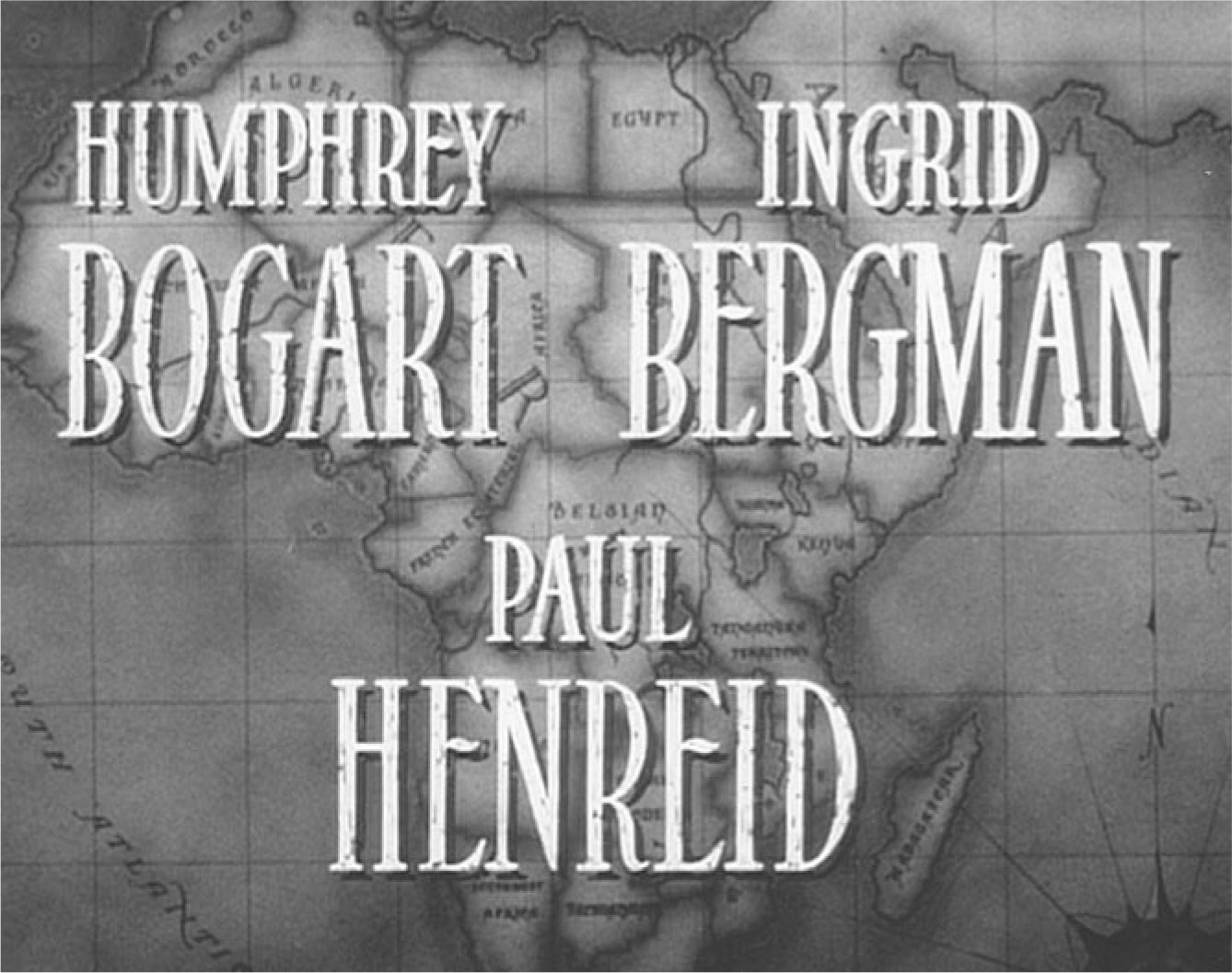 The exhibit displays a scene from movie “Casablanca” featuring the title credits “Humphrey Bogart, Ingrid Bergman, and Paul Henreid” against the backdrop of a map.