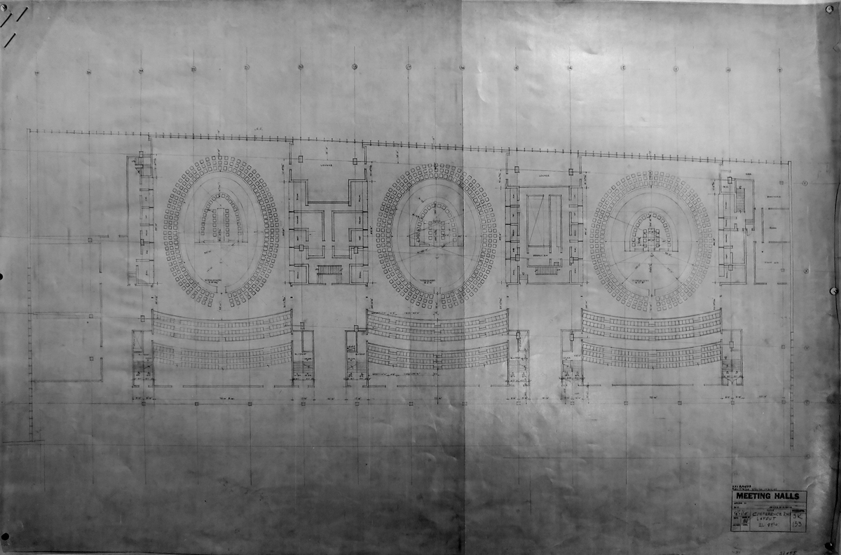 Architectural plan showing three conference rooms with oval tables at the center and a seating area on one side for press and public.