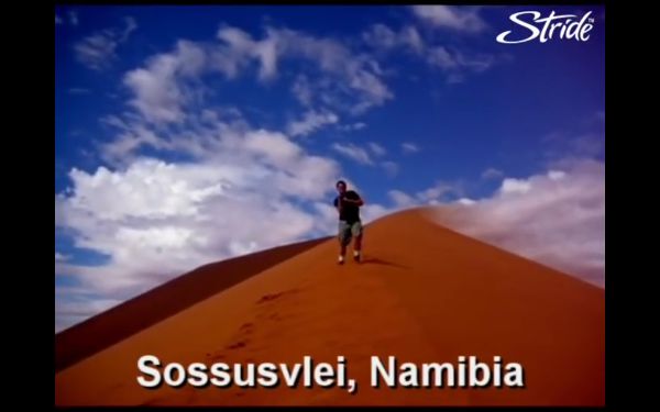 Dancer performing on a sand dune