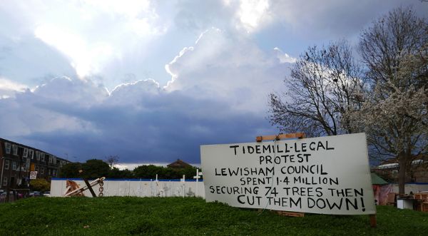Sign protesting the loss of trees nearby Old Tidemill Wildlife Garden and the Thames Tideway super sewer.