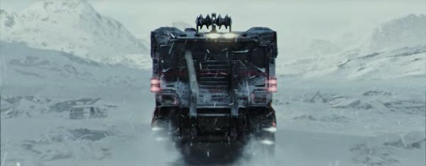 An exterior shot of the rear of a large, ground-based vehicle with winch.
