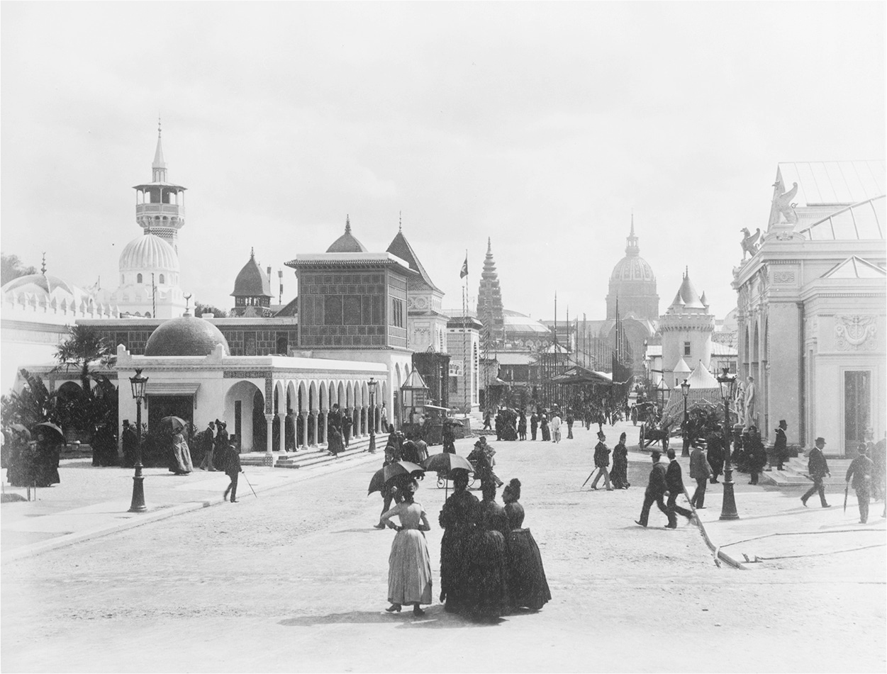 A photograph of Esplanade des Invalides with people crowded in the street.