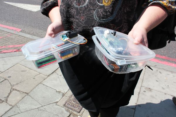 Demonstration of DIY citizen-sensing devices by Citizen Sense researcher during a test walk in London.