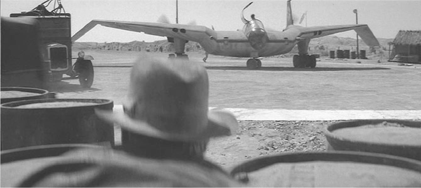 The exhibit showcases a scene from “Indiana Jones and the Raiders of the Lost Ark,” where the theft of the “Flying Wing” occurs, drawing parallels or borrowing elements from the ending of “Desperate Journey.”