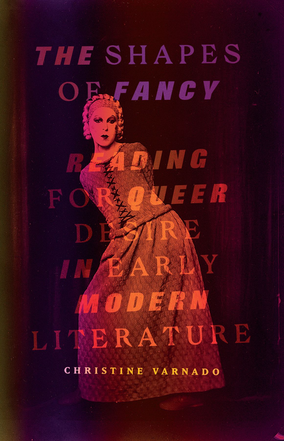 Cover, depicting a person in a dress with hip out and arms behind the back