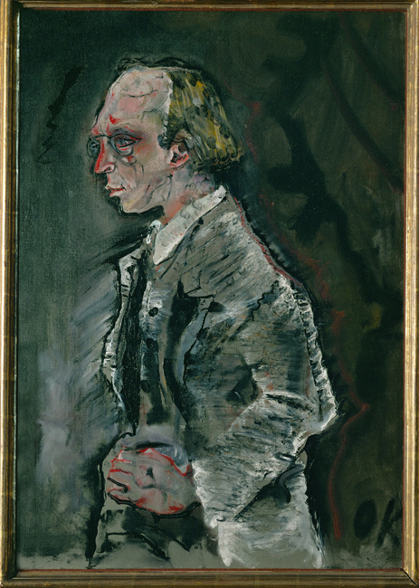 In Oskar Kokoschka’s “Portrait of Herwarth Walden (1910),” the depicted side view of the man, Herwarth Walden, in formal attire with hands on the hip and looking into the distance, is characterized by an elongated and exaggerated face, conveying an intense and dynamic personality.