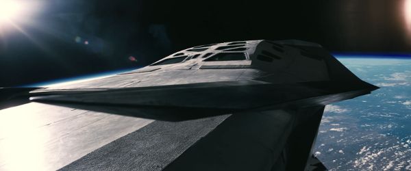 Futuristic spacecraft in orbit around an Earthlike planet.