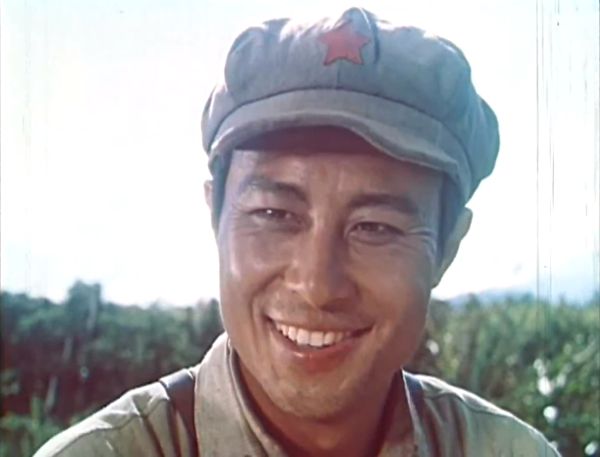 Closeup of the smiling young male soldier