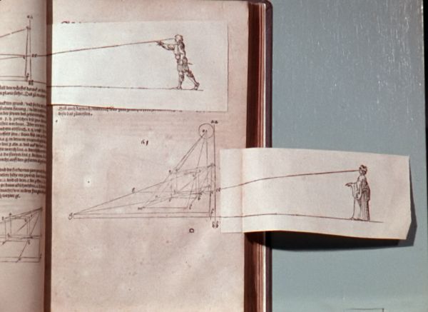 A line-drawn diagram of vision on the page of an old-looking book.