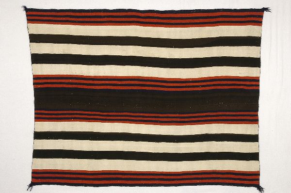 A rectangular woven blanket with red, black, and cream horizontal stripes.