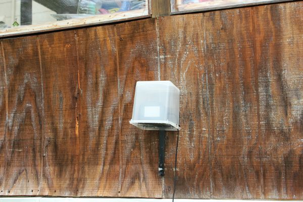 Installation of Speck PM2.5 monitor with weatherproof housing in the “death triangle” of a resident’s house near fracking infrastructure.