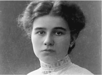 The exhibit showcases a formal portrait of Karin Bergman with a blank or empty expression.