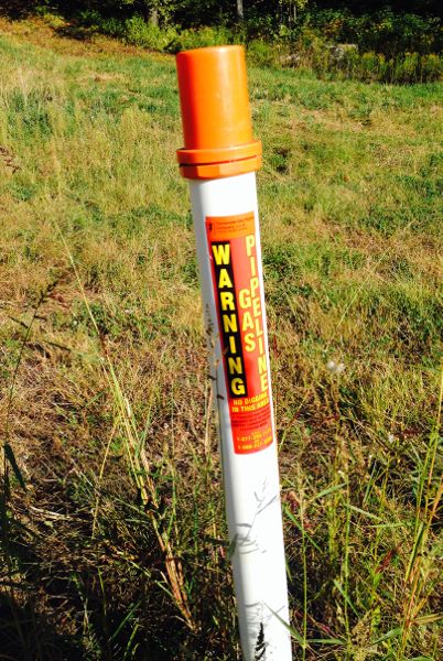Gas pipeline infrastructure encountered during walk with participants near fracking sites in Pennsylvania.