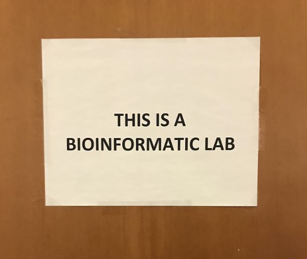 Door with plaquard reading “This is a Bioinformatic Lab.”