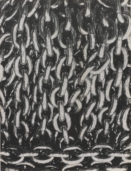 Close-up of chain links hanging, above a row of horizontal links.