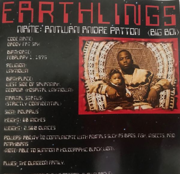 Track listing in a stylized arcade/video game font, evocotive of the 1980s, with an image of Big Boi sitting in a large chair with his yound child on his lap.