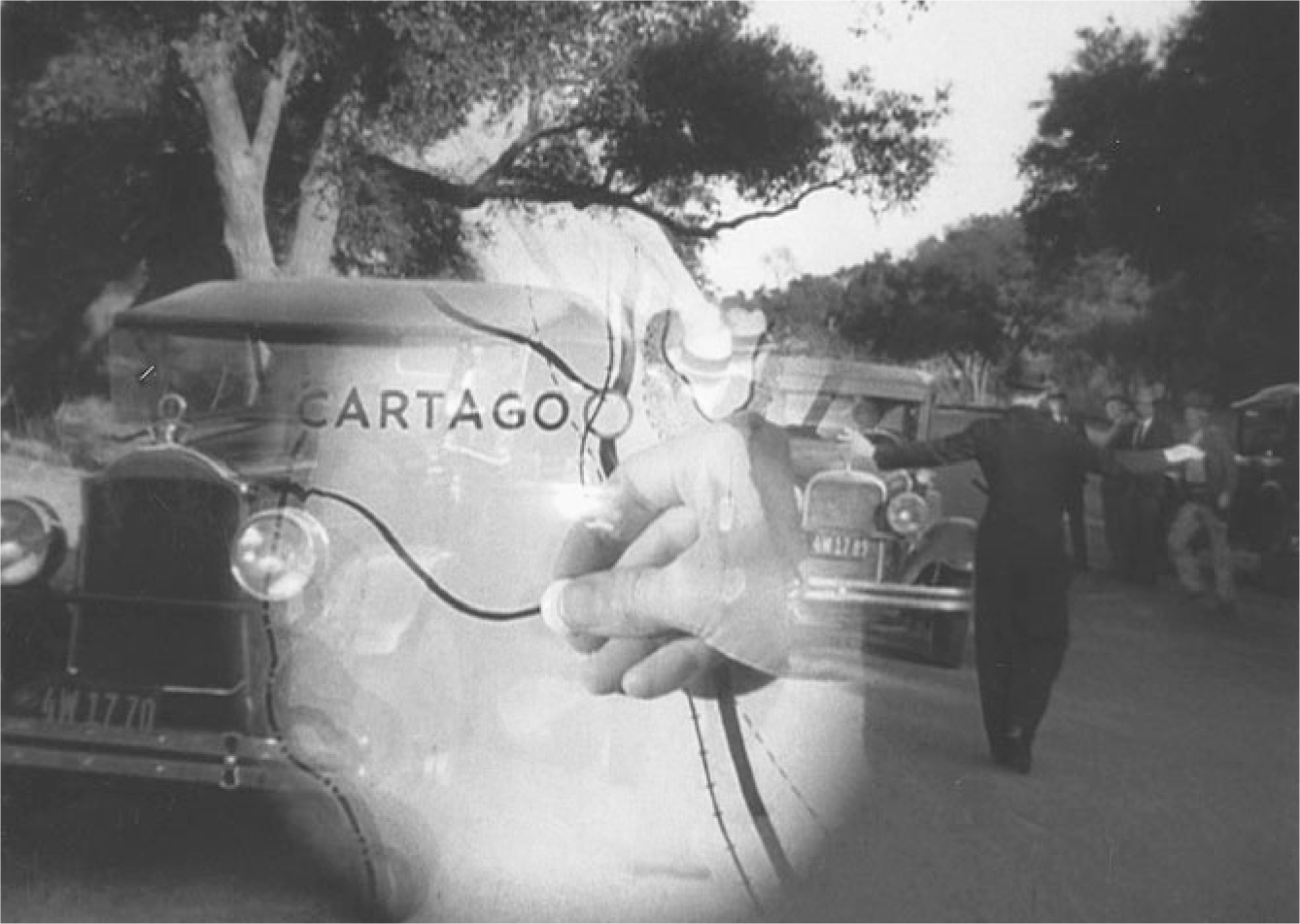 The exhibit features a scene from “High Sierra” where the police pursue Roy Earle, who is shown with his hands extended sideways on the road with parked cars nearby. This scene is superimposed with an image of an individual studying a road map.