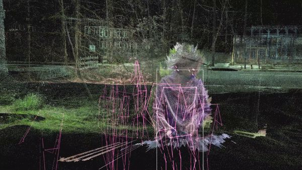 A ghostlike lidar image with buildings at the background and a figure at the front, like front of a DJ set.