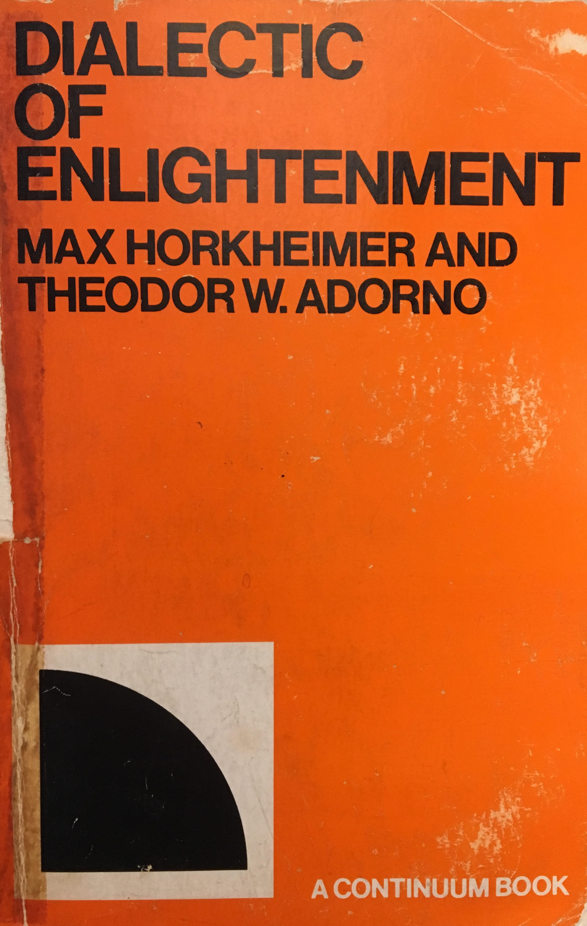 Orange background with black title text at top in sans-serif front. In the lower left a white box encloses a black quarter circle.