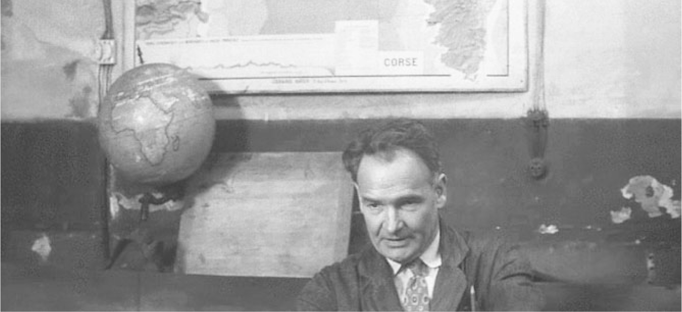 In a scene from “Les 400 coups,” Petite-Feuille surveys a classroom adorned with maps, including lower France and Corsica, a globe highlighting Corsica and Africa, and an antique map of Europe and North America.