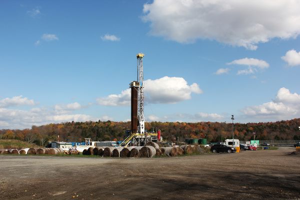 Fracking well pad undergoing active drilling.