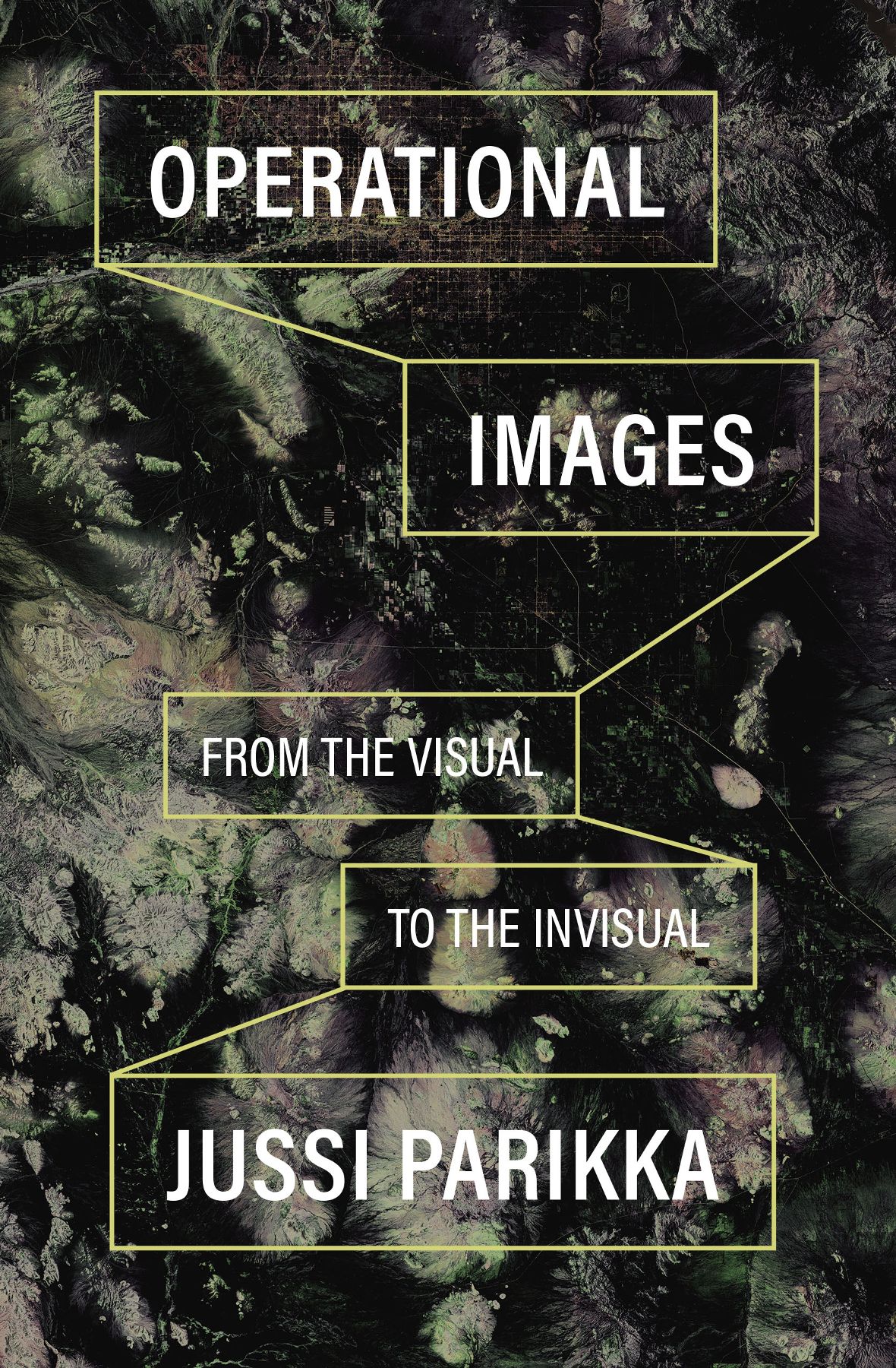 Satellite photo on which white title words appear in yellow boxes. Yellow lines connect the boxes.