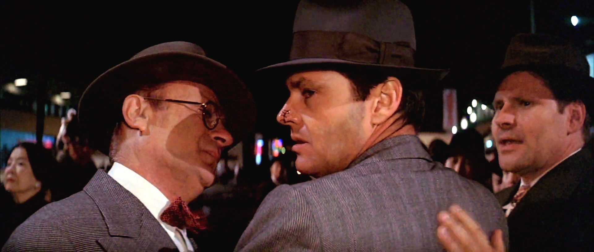 Walsh restrains Jake as he tries to turn back to Evelyn’s body in the film’s final scene.