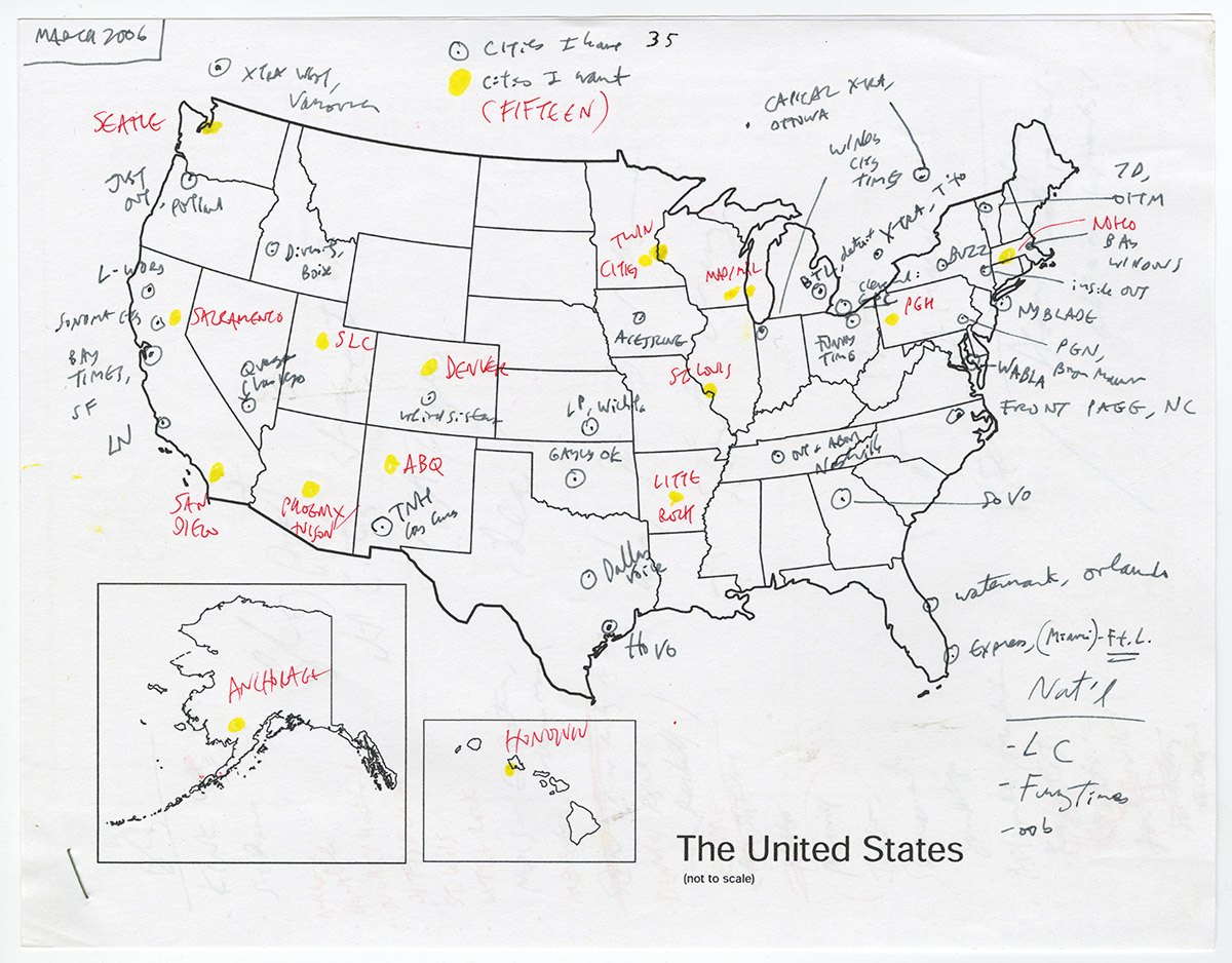 Alison Bechdel annotates a United States map, marking the cities where she is publishing her comic and those where she would like to be publishing.