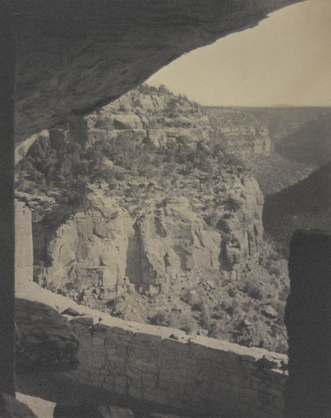 Oblique view through a large built opening of a canyon.