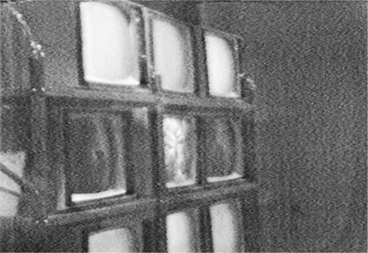 A photograph of 3 rows of ancient times televisions. This shows the side view of the objects.