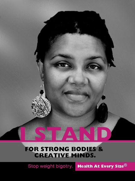 A poster of a woman looking confidently at the camera. The caption reads “I stand for strong bodies and creative minds. Stop weight bigotry.”