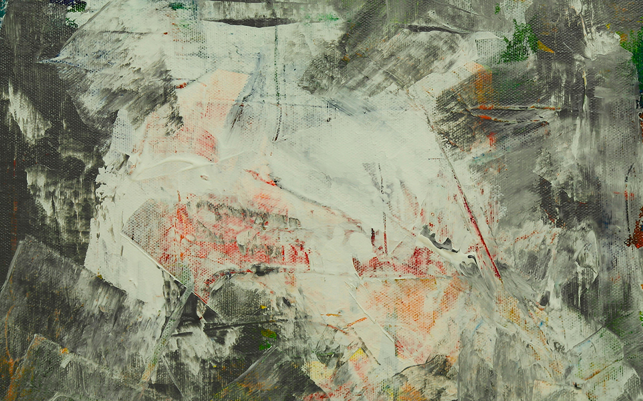 Abstract painting in charcoal and white with splashes of red and yellow done in bold brushstrokes, conveying change..