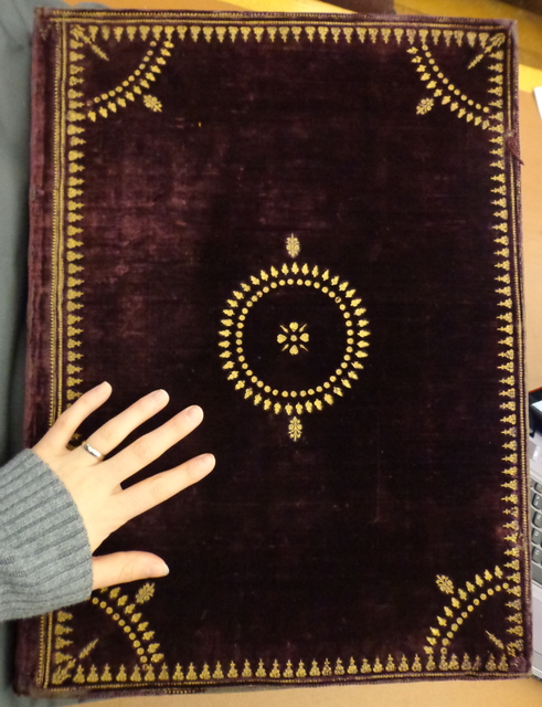 Photograph of a velvet purple binding made at Little Gidding